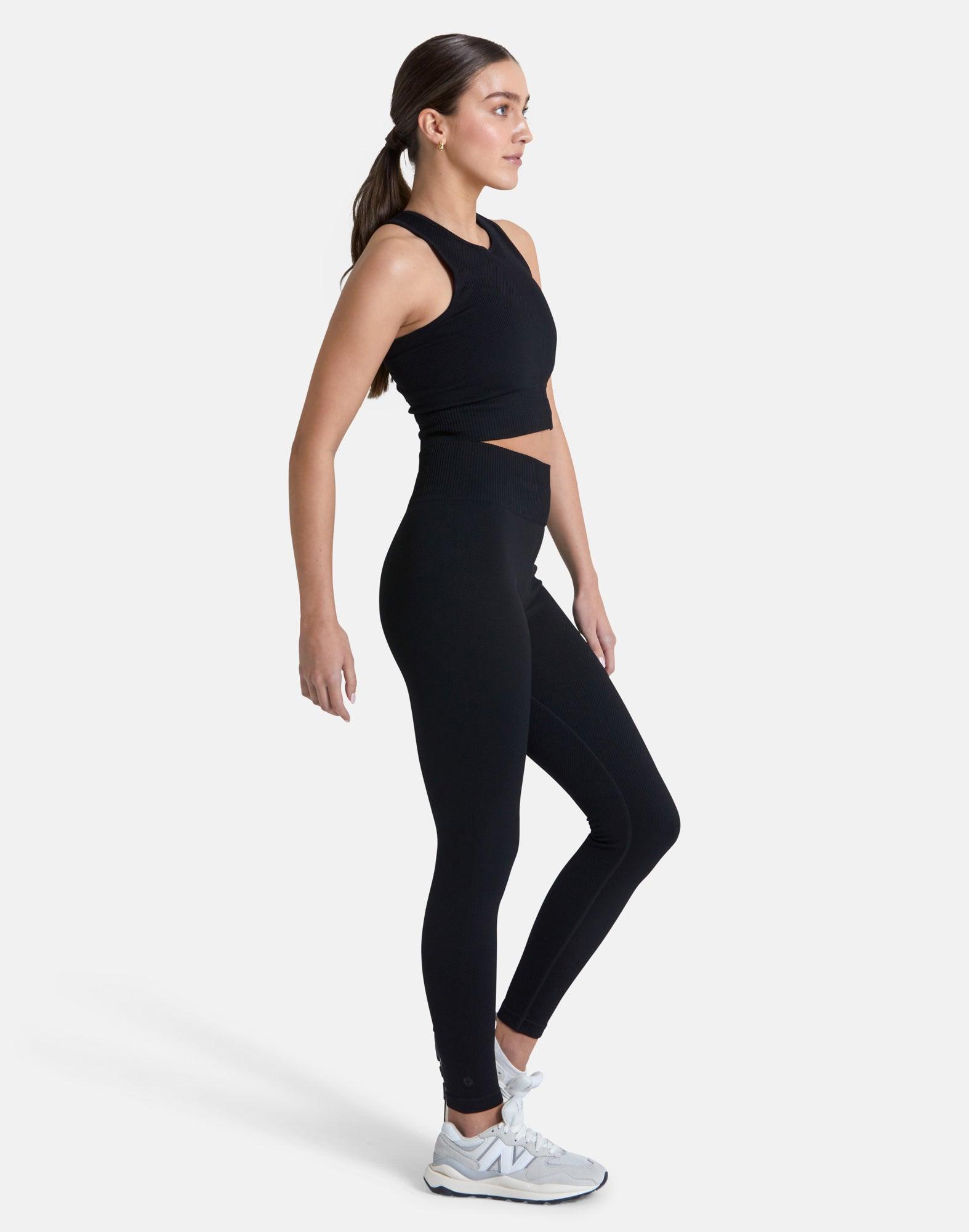 http://gympluscoffee.com/cdn/shop/files/essential-seamless-legging-in-black-leggings-gym-coffee-6.jpg?v=1699454458